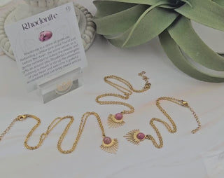 Rhodonite Gemstone Sunburst Necklace: Stainless Steel Celestial Pendant